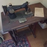 A good Vintage Singer Sewing Machine on stand. 78 cms x 41cms x 102 cms.