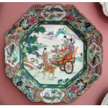 Withdrawn.A really good early Oriental Charger in octagonal shape with hand painted scenes allover.