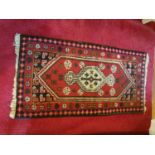 A small Eastern Rug.