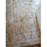 A very large Cashmere style Rug with cream ground. (1 cut in edge).