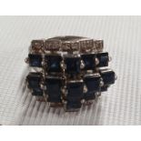 An 18ct Gold Sapphire and Diamond Ring.