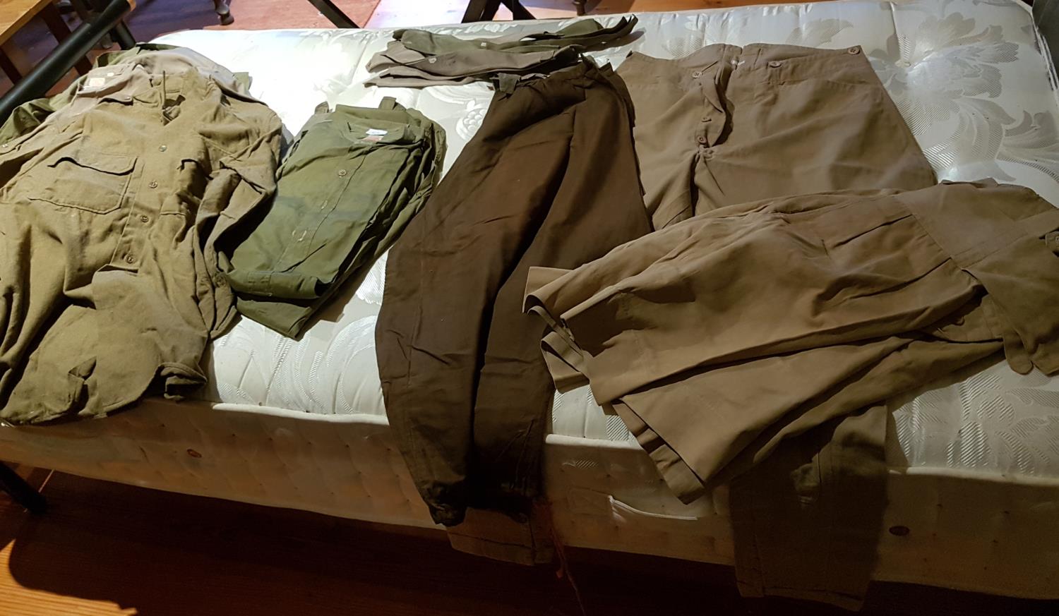 A quantity of Vintage Uniforms.