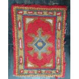 Three small Rugs.