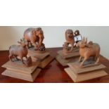 Four quite rare 19th Century Hardwood Figures of Animals on plinth bases. Early 20th Century