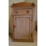 A 19th Century Stripped Pine single door Cabinet.
