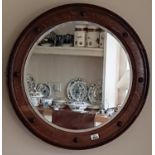 A lovely Circular Oak Mirror by Denby & Spinks of Leeds. 64 cms diam.