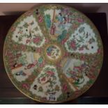 A 19th Century Chinese Charger with hand painted decoration. 37 cms