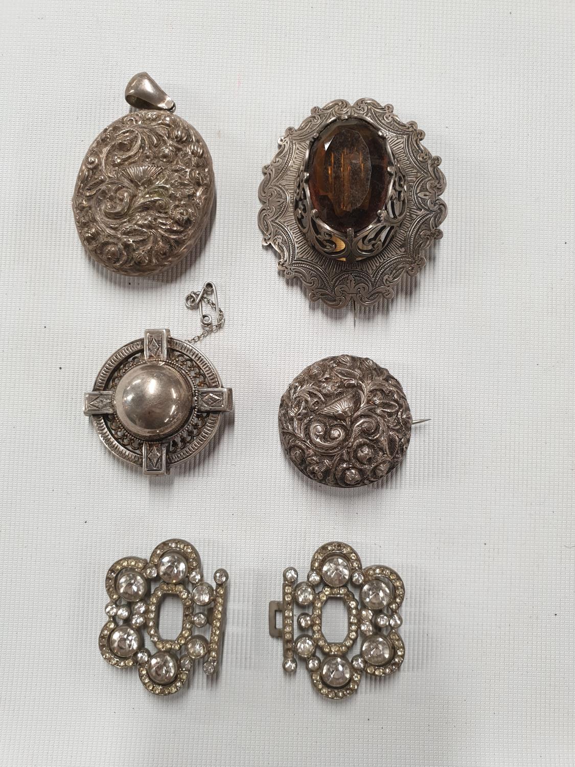 A good quantity of vintage Brooches along with a diamonte Buckle.