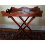 A large Mahogany Butlers Tray on stand. 80 cms x 52 cms.