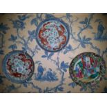 A group of three Oriental Plates. 18cm. Plate with figures 20cm.