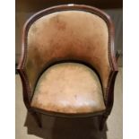 A late 19th Century Mahogany Showframe Tub Chair with leather upholstery.