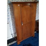 An Edwardian Mahogany neat single door Wardrobe.