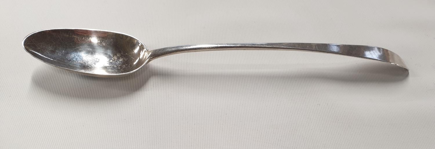 An Irish Silver Basting Spoon marks rubbed but probably 1786. Bartholomew W Delandre.