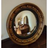 A good pair of 19th early 20th Century Oval Convex Mirrors with ball decoration. Peace's