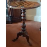 A 19th Century Walnut Games Table with a chess board top.Size Diameter 47 X H 70cms.