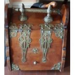 An Edwardian Walnut and Brass mounted Coal Scuttle.