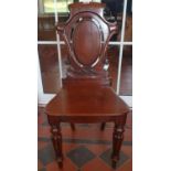 A 19th Century Mahogany Hall Chair.