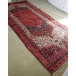 A unique Persian Village Rug.Size L 300 x W 135cms.