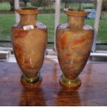 A pair of Royal Doulton Stoneware vases (AF).