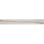 A very long strand of cultured Pearls with a 9ct gold clasp.