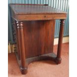 A really good 19th Century Rosewood Davenport with fitted top drawer and interior and with turned