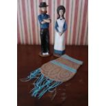 Two pottery Amish Figures and a Beadwork Purse.