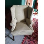 A 19th Century Wingback Chair.