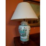 A really good pair of oversized Table Lamps in the Oriental taste, profusely hand painted with