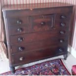 A Victorian Mahogany Scotch Chest of Drawers.