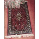 A small Eastern Rug.