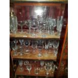 A large quantity of Crystal and Glassware in one cabinet.