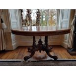 A fantastic 19th Century Walnut Inlaid Oval Salon Table with highly inlaid parquetry top on a turned