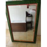 A large painted Mirror.