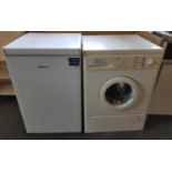 A Beko Freezer along with a Washing Machine.