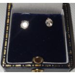 A pair of antique diamond stud earrings.