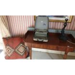 A Vintage Remington Typewriter, a lamp and a long kelim cushion.