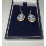 A pair of gold and Cameo set Earrings.