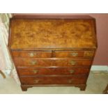 A 19th Century Yew Wood Bureau with fitted interior.