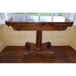 A Regency Rosewood Foldover Card Table.