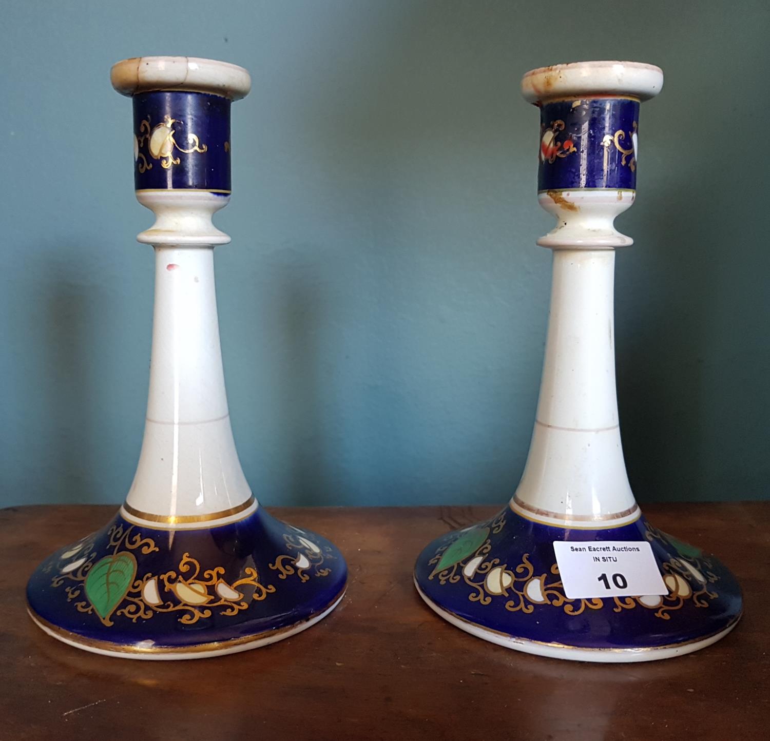 A pair of 19th Century Candlesticks along with a Table Lamp.