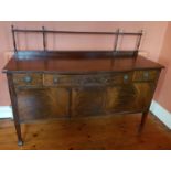 A really good late 19th early 20th Century Bow fronted Sideboard with a highly carved front and