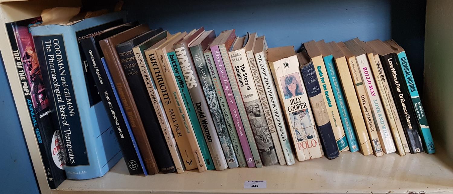 'Ronnie', the story of Ronnie Drew along with other Books in two shelves.