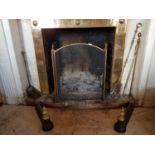 A pair of 19th Century Steel and Brass Dogs along with a Fire Screen and Irons.