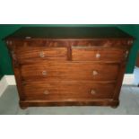 A Victorian Mahogany low Chest of Drawers with original glass knobs.