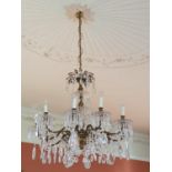 A fabulous early 20th Century Brass and Crystal ten branch Ceiling Light profusely decorated with
