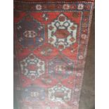 A small Rug with allover decoration. 155 x 90cm.