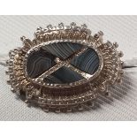 An antique silver Scottish stone set Brooch.