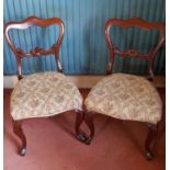 A good set of six Victorian Mahogany Buckleback Chairs with upholstered seats.