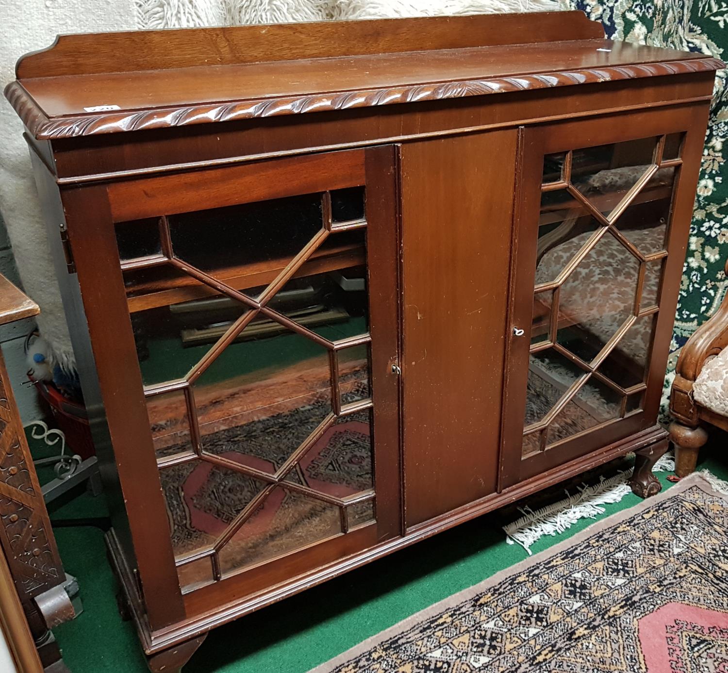 A 1920's Mahogany glazed Cabinet.