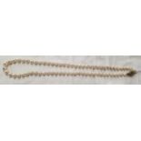 A good cultured pearl Necklace with a gold and diamond clasp.